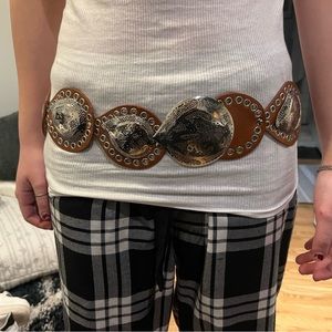 Southwest Concho belt with hook closure. Size ladies Small.